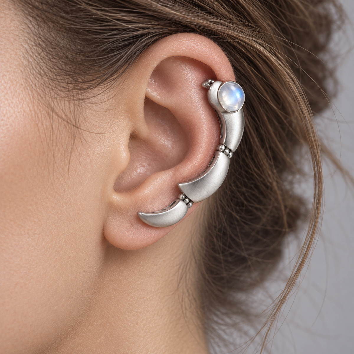 Lunar Hinge jewelry worn on model
